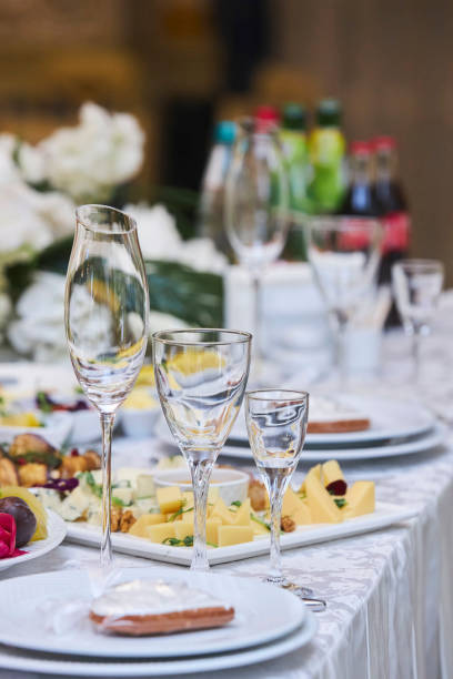 istock Crystal glasses on the festive table. Serving in the restaurant 1916503251