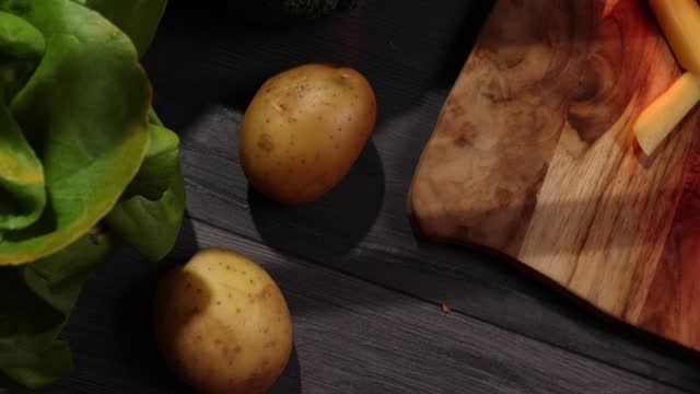 Close-up footage of fresh organic vegetables on table ready for cooking