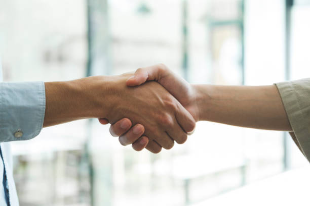 istock Businessmans handshake after good deal. 1916562682