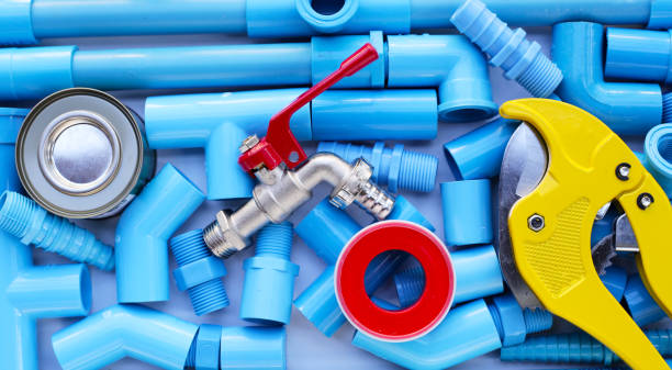 istock Plumber equipment with blue pvc pipe connections for plumbing work. 1916575430