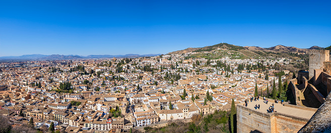 Panorama of Alicante old town and Santa Barbara Castle on Benacantil hill. Cathedral, narrow streets and white houses in ancient neighborhood Casco Antiguo Santa Cruz. Costa Blanca region in Spain.