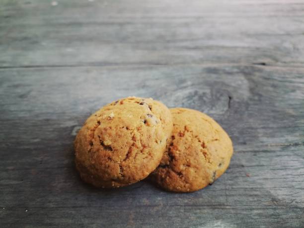 istock Chocolate chip cookies on wood background 1916578622