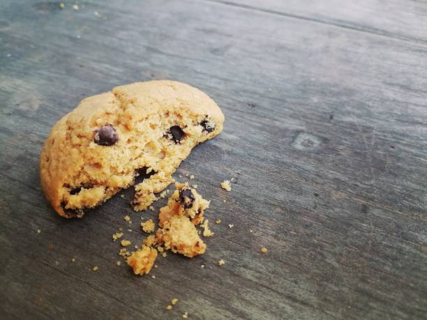istock Chocolate chip cookies on wood background 1916578624