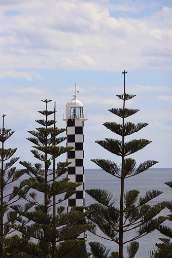 The stunning scenery of a lighthouse situated on the coast in Bunbury, Australia