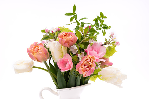 Elegant mixed pastel colored spring bouquet on white background. Spring tulips. Tulips bouquet.