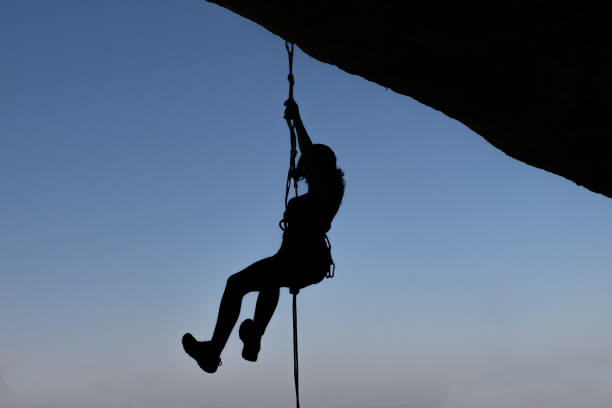istock Girl climbing on a mountain 1916635287