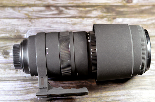A telephoto lens, a specific type of a long-focus lens, the physical length of the lens is shorter than the focal length, telephoto group that extends the light path to create a long-focus lens, selective focus