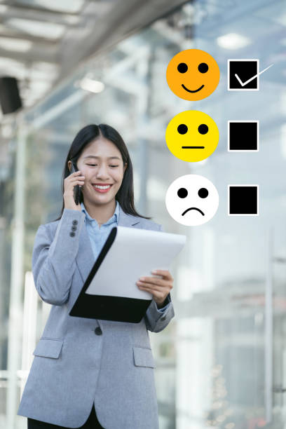 istock Happy Client customer experience concept. Woman recording phone inquiry with checkboxes, smiling face rating excellent for satisfaction survey. 1916661297