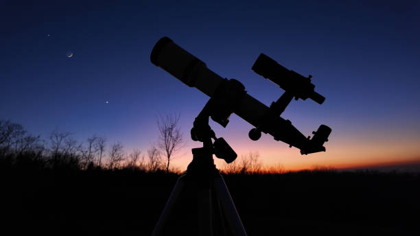 istock Astronomical telescope for observing stars, planets, Moon, celes 1916696196