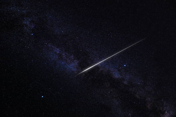istock Milky Way stars and shooting star. 1916700926