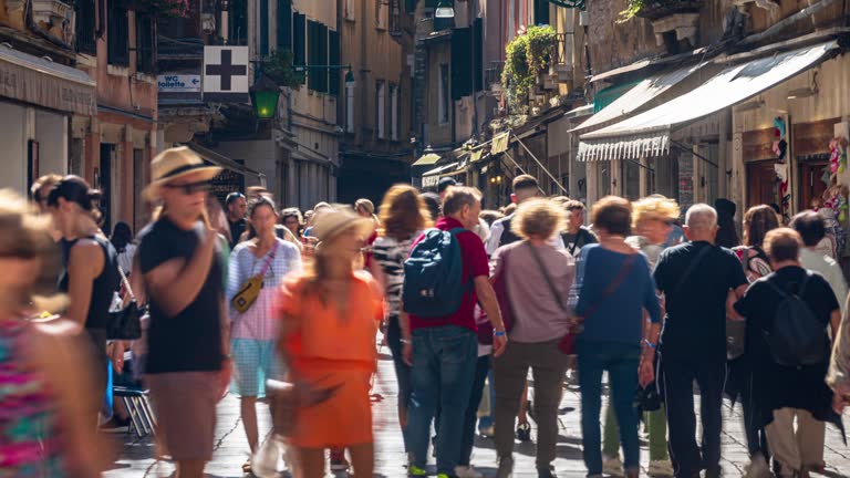 Time Lapse of Crowded people tourist walking and shopping in city of Venice at the sunny time, Italy