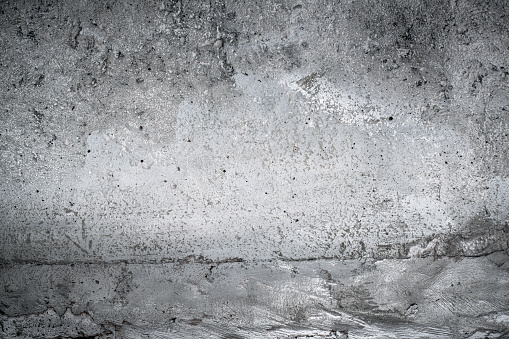 Aged concrete wall texture. Dark grunge background