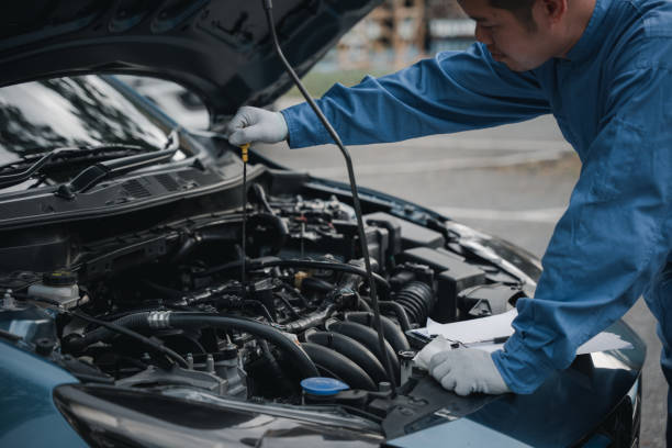 istock Mechanic repairing car 1916759536