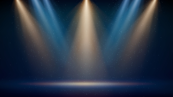 Golden, blue spotlight backdrop. Illuminated blue stage. Background for displaying products. Bright beams of spotlights, shimmering glittering particles, a spot of light. Vector illustration