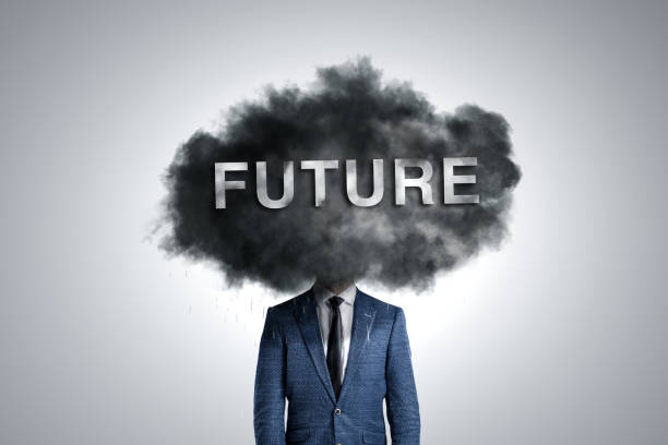 istock Anxiety about the Future - Person Covered by a Dark Cloud 1916780521