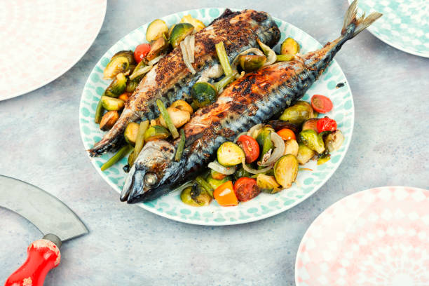 istock Mackerel fish baked with vegetables. 1916798650
