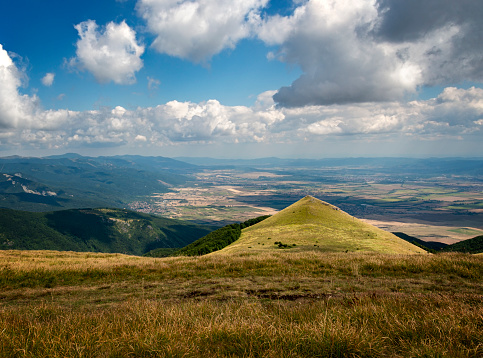 Looking at Chafuta peak from Ispolin peak in Stara Planina. Shipka and Sheinovo towns can be seen in the valley. Gabrovo province, Bulgaria, Europe.