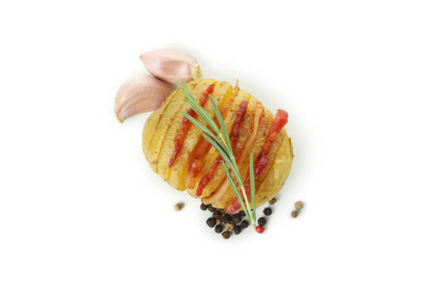 Baked potato with bacon isolated on white background.