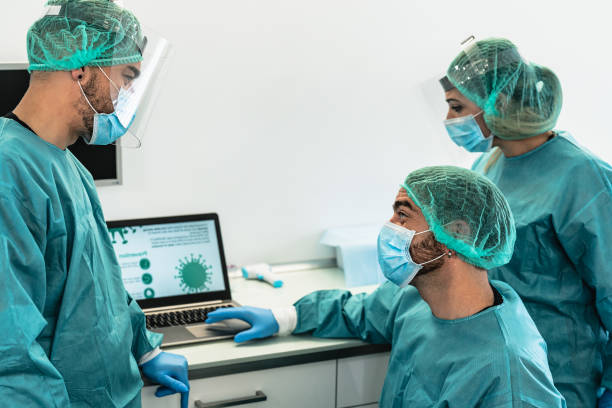 istock Doctors analysing coronavirus disease - Healthcare concept 1916895511