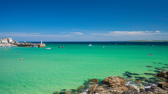 A view of the aqua coloured sea, off the coast of St. Ives, Cornwall, England, on a sunny summer's day