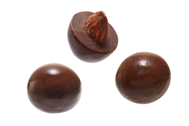 istock Chocolate balls with hazelnut isolated on white background 1916937900