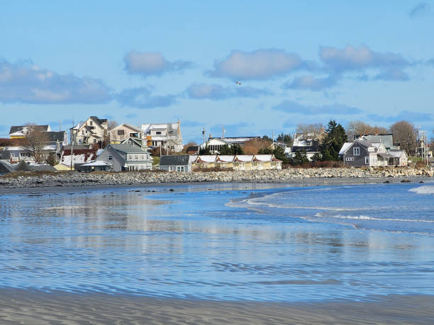 istock Beach with small town in view 1916942239