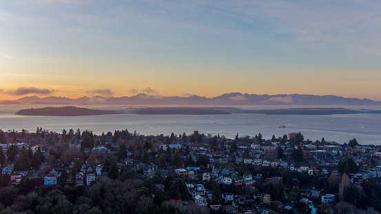 Arial view of West Seattle and the Olympic Mountains at sunset in December