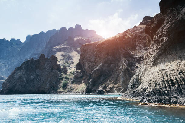 Karadag mountain range in Crimean peninsula, an ancient extinct volcano. Location Kara Dag (Black Mount), coastal town of Koktebel and the Otuzka River valley. Unique place on earth. Beauty world.