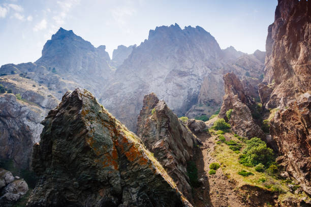 Karadag mountain range in Crimean peninsula, an ancient extinct volcano. Location Kara Dag (Black Mount), coastal town of Koktebel. Unique place on earth. Explore the world's beauty and wildlife.