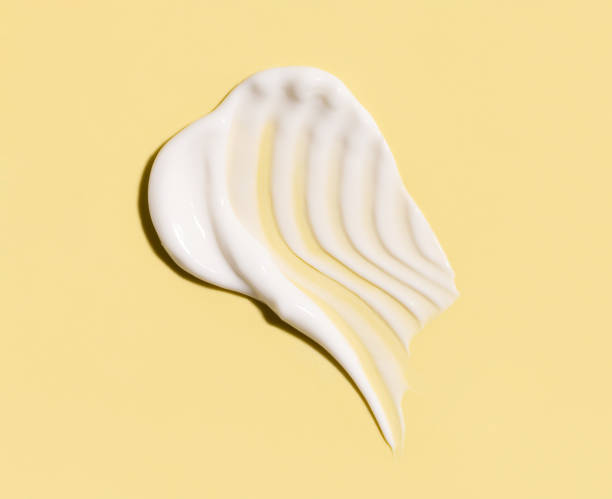 istock cosmetic smears cream texture on pastel background 1917015856