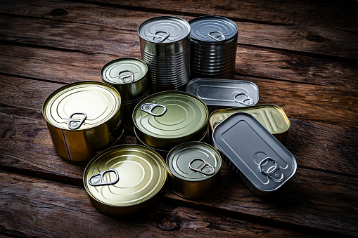 High angle view drink can on the concrete background with sunlight reflection and shadow