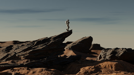 Astronaut on alien planet, red planet Mars. Space exploration, Martian colony, science, solar system. Rocky surface landscape. 3d render
