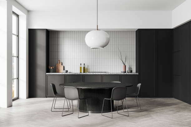istock Luxury home kitchen interior with cooking and eating space, panoramic window 1917036790