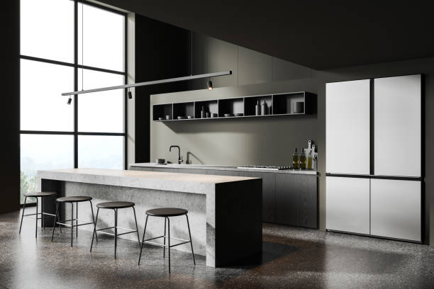 istock Grey home kitchen interior with stone bar counter and cooking corner, window 1917038590