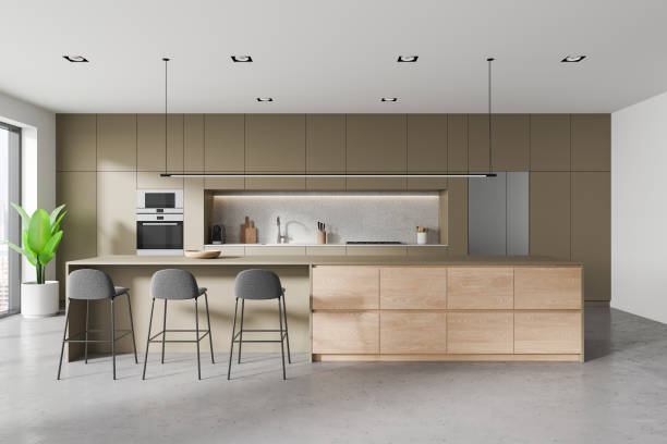 istock White and beige kitchen interior with cabinets and island 1917044840