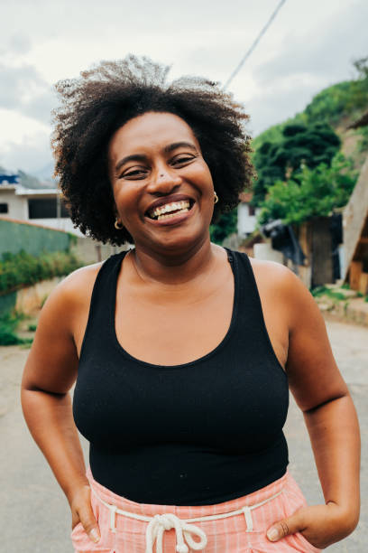 istock Smiling woman at street looking at camera 1917044844