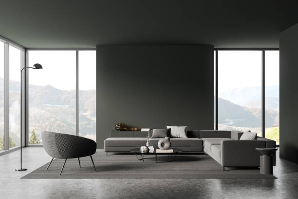 istock Grey home living room interior with relax place, mock up wall and window 1917046587