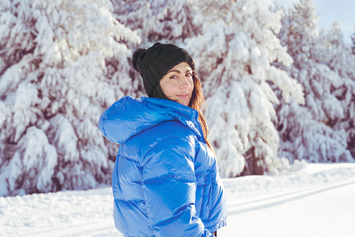 Beautiful woman standing in the winter snowy mountain .Vitosha,Bulgaria