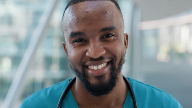 Man, nurse and smile on face, confident and pride for career at hospital or clinic. Black male person, medical professional and happy with healthcare, portrait and consultation or trust in Nigeria