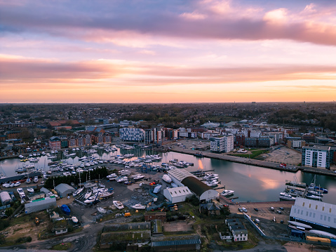 Ipswich, Suffolk, UK - 10th December 2023: An aerial photo of the Wet Dock in Ipswich, Suffolk, UK at sunrise