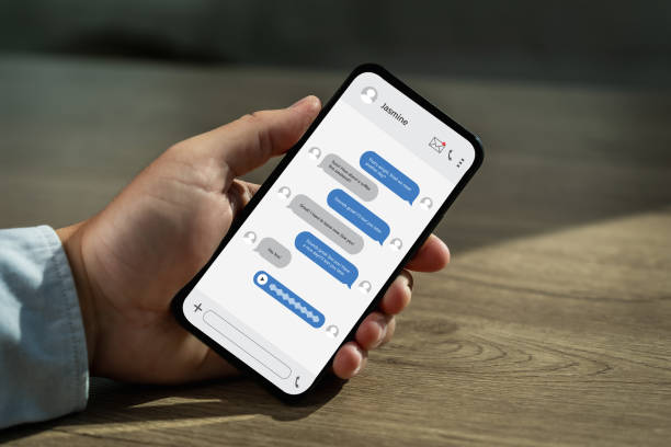 istock Man chatting on mobile phone chat message online screen app in smartphone 1917055796