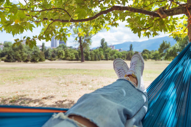 istock Woman relaxing in hammock 1917058048
