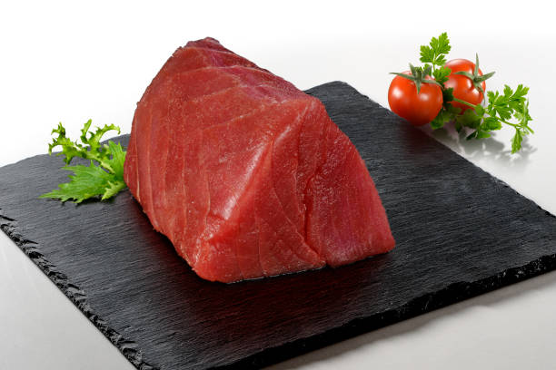 istock Tuna fillet on a square stone plate 1917058091