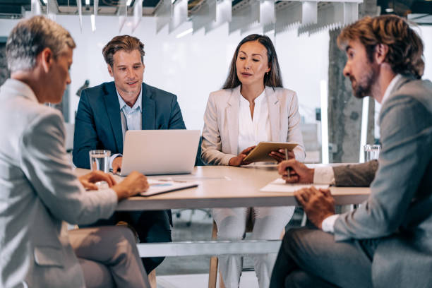 Business persons on meeting in the office.
