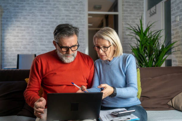 istock Senior couple doing tax return 1917154330