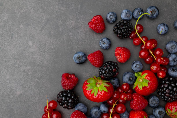 istock Berries Background. Strawberries, Blueberry, Raspberries, and Blackberry. 1917191107