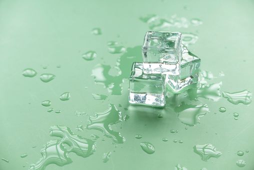 Ice cube isolated on white background.