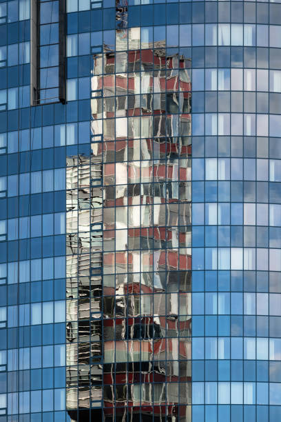 Distorted Reflections on Glass Skyscraper stock photo