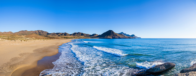 Playa de Los Genoveses, a remote wide beach within walking distance through wild plants and low dunes of sand (8 shots stitched)