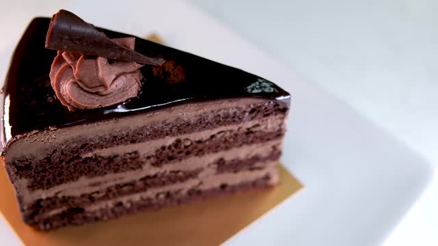 Panning video delicious chocolate cake in international restaurant freshness on morning